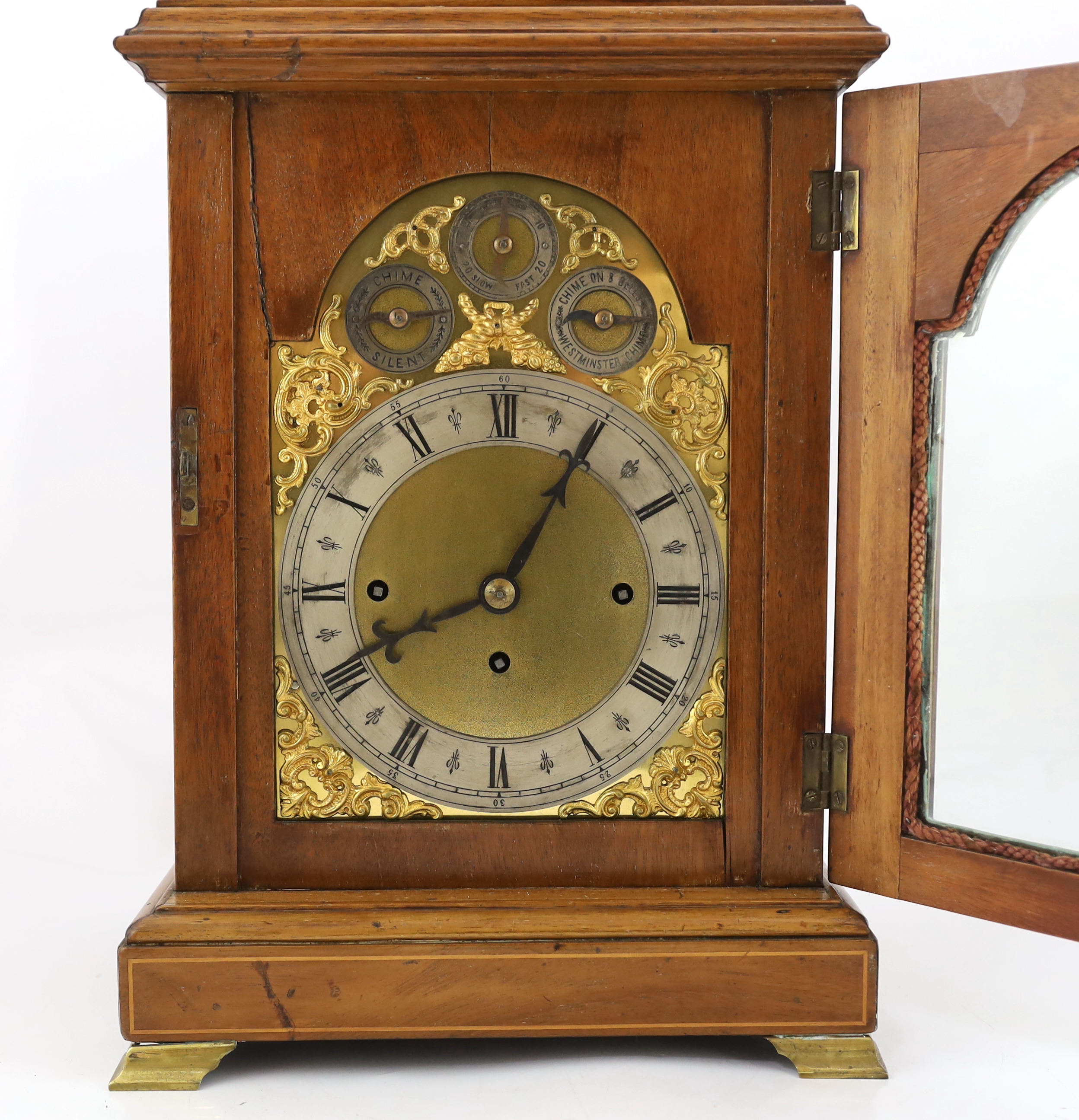 An Edwardian marquetry inlaid mahogany eight day chiming bracket clock 32cm wide, 27cm deep, 55cm high